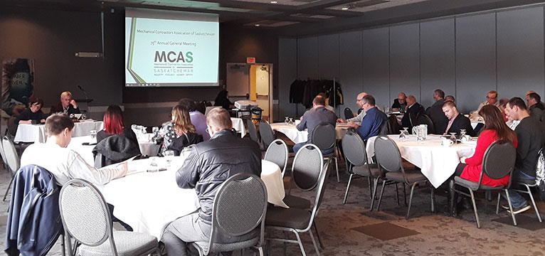 Photo of a presentation from the MCAS 75th Annual General Meeting